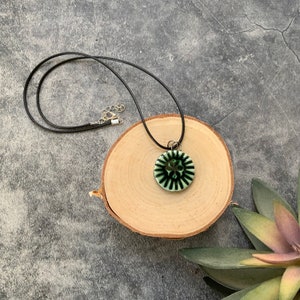 Green circle ceramic pendant, porcelain pendant necklace, waxed black cord, ceramic jewelry, stamped clay, textured