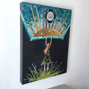 May include: A mixed media painting on canvas depicting a woman with long red hair reaching up to hold a blue and gold crescent moon with stars. The background is a dark blue with a mosaic pattern.