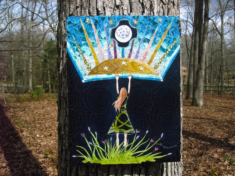 May include: A mosaic artwork depicting a woman holding up a blue and gold sky with a crescent moon and stars. The woman is wearing a green dress and has red hair. The background is black with a swirling pattern.