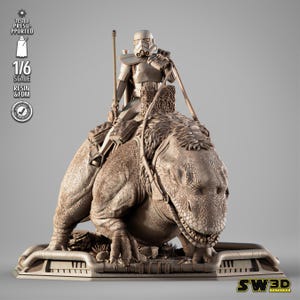 May include: A 1/6 scale resin and FDM printed model of a Stormtrooper riding a large, reptilian creature. The model is painted in a light brown color and is posed in a dynamic action pose. The model is on a base with the text "SW3D Editions" printed on it.