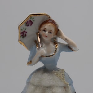 Porcelain Figurine of Lady with Umbrella