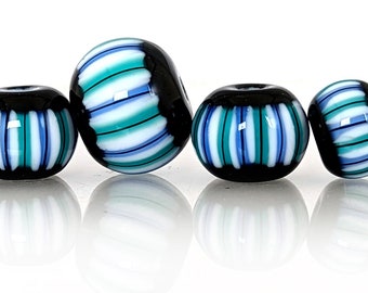 Aqua blue, white, and black stripes on soft denim blue bead set, Contemporary patterns in glass, handmade lampwork beads by JC Herrell