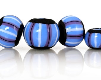 Pink, black, and black stripes on periwinkle blue bead set, Contemporary patterns in glass, handmade lampwork beads by JC Herrell