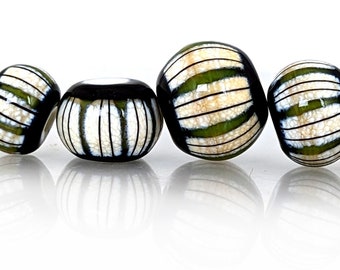 Moss green and black stripes on mottled parchment bead set, Contemporary patterns in glass, handmade lampwork beads by JC Herrell