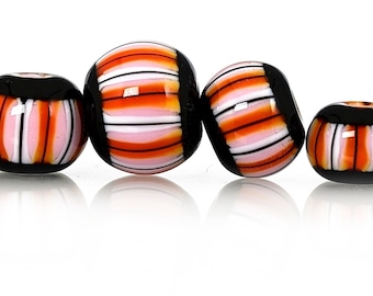 Pomegranate, white, and black stripes on pink bead set, Contemporary patterns in glass, handmade lampwork beads by JC Herrell