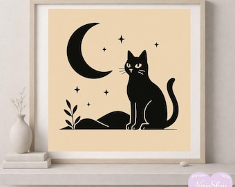 May include: A framed print featuring a black cat silhouette sitting beneath a crescent moon and stars. The artwork has a minimalist design with a beige background and a black cat, moon, and stars. A small plant is also included.