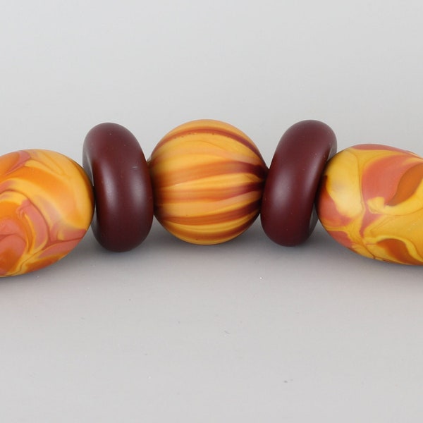 Almost Pucci set of blown glass beads by Aja Vaz tumble etched