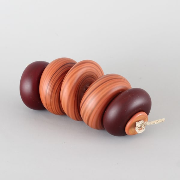 Pinky terracotta disc beads set of 7