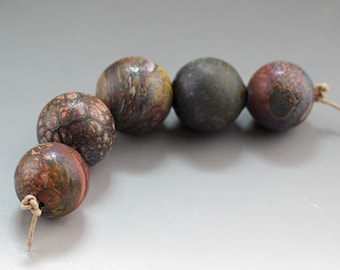 handmade blown hollow glass bead set of 5 by Aja Vaz tumble etched matte