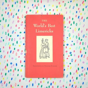 May include: A vintage book titled "The World's Best Limericks" with a red cover. The cover features a black and white illustration of two figures and the text "Illustrated by Richard Floethe". The book is set against a white background with colorful, oval-shaped patterns.