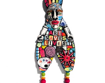 Art Saves Lives. (An Original Junk Assemblage Mosaic Salvaged Trash Doll Mixed Media Wall Hanging by Artist Shawn DuBois)