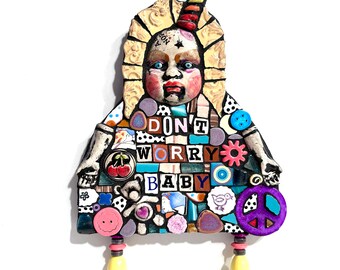 Don’t Worry Baby. (An Original Junk Assemblage Mosaic Salvaged Trash Doll Mixed Media Wall Hanging by Artist Shawn DuBois)