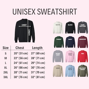 Pode incluir: Tabela de tamanhos de moletom unissex com medidas em polegadas e cent&iacute;metros. A tabela mostra as medidas de t&oacute;rax e comprimento para os tamanhos S, M, L, XL, 2XL e 3XL. A tabela tamb&eacute;m mostra uma variedade de cores para o moletom, incluindo branco, preto, cinza escuro, verde floresta, azul marinho, vinho, cinza esportivo, rosa claro, vermelho, areia, azul claro e verde militar.