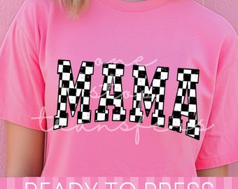 May include: A pink t-shirt with the word "MAMA" in a black and white checkered pattern across the front. The text "READY TO PRESS" is displayed in a horizontal banner at the bottom of the shirt.