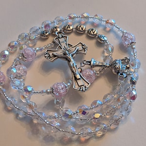 Personalized clear AB Czech crystal rosary beads with pink crackle glass,  crucifix and center imported from  Italy