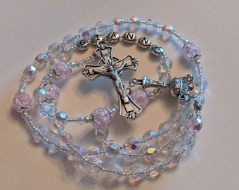 Personalized clear AB Czech crystal rosary beads with pink crackle glass,  crucifix and center imported from  Italy