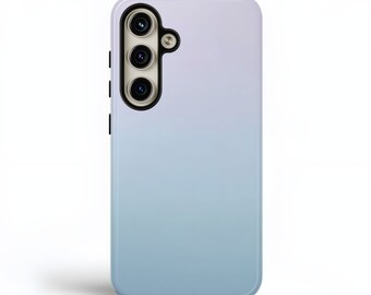 May include: A rectangular smartphone case featuring a smooth gradient color transition from a pale lavender at the top to a soft light blue at the bottom. The case includes a black camera module cutout with three circular lenses and a flash.