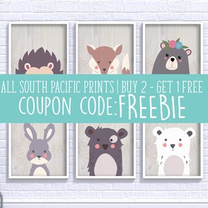 May include: Six framed animal art prints. The prints feature a hedgehog, fox, bear, bunny, bear, and polar bear. The animals are depicted in a cartoon style with soft colors. The background of each print has a wood grain texture. The text "ALL SOUTH PACIFIC PRINTS" and "COUPON CODE: FREEBIE" is visible.