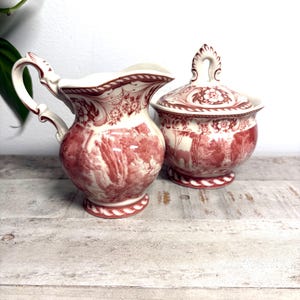 May include: A rustic wooden sign with the text "Welcome" in a handwritten style. The sign features a distressed finish and a simple, inviting design, perfect for a front porch or entryway.