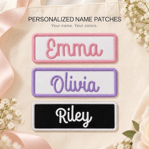 May include: Three rectangular embroidered name patches with white centers and colored borders. The top patch has a pink border and the name Emma in pink. The middle patch has a purple border and the name Olivia in purple. The bottom patch has a black border and the name Riley in white. Text reads: PERSONALIZED NAME PATCHES Your name. Your colors.