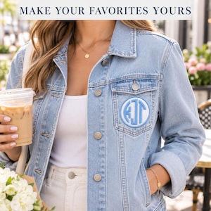 A woman wears a light denim jacket with a white circular patch, Baby Blue monogram and matching border on the chest pocket. She holds an iced drink. Heading: Make your favorites yours.