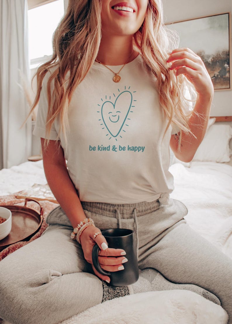 A heart with a smiling face on a t-shirt.