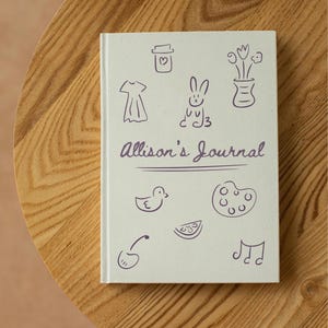 Hand drawn doodle elements on a journal.