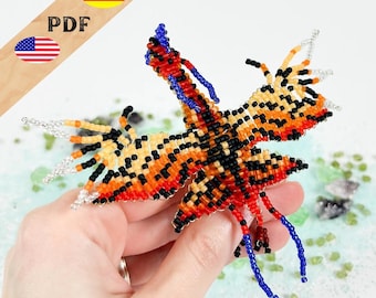 May include: A beaded butterfly in shades of orange, black, and yellow, with blue and silver accents. The wings are intricately detailed, and the body is a mix of colors. The image includes the text "PDF" and flags of the USA and Germany.
