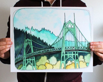 May include: A rectangular art print featuring a watercolor and ink illustration of a green suspension bridge. The bridge is set against a backdrop of dark green pine trees and a light blue sky, with yellow and green foliage at the base of the structure.