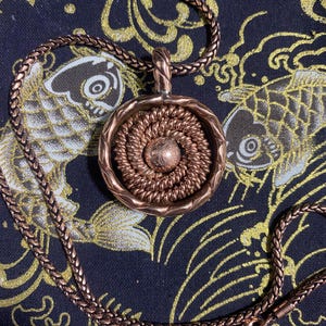 Dragon Rodin Coil Tensor Pendant