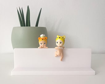 Sonny Angels display stand. View on both sides. Holds 7 figures. 3D printed.