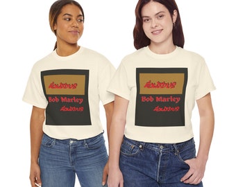 May include: Two off-white t-shirts featuring a graphic design. The design includes the word "Exodus" in red, above "Bob Marley" and the word "Exodus" again. The shirts are paired with blue jeans.
