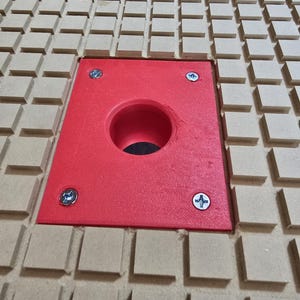 May include: A white ceramic mug with a black handle and the text "But First, Coffee" in a black, bold font. The mug is on a white surface. The mug is approximately 10 cm tall.