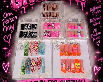 May include: A collection of press-on nail sets displayed in clear plastic cases and on white cards. The designs feature various colors, patterns, and 3D embellishments. Text on the image includes NAIL SET GIVEAWAY, PAY ONLY FOR SHIPPING, and instructions for claiming the custom nail sets from an Etsy shop.