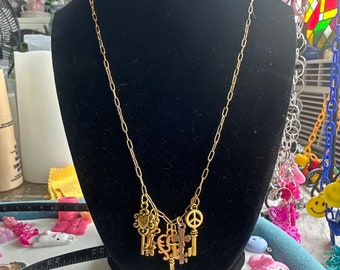 Goldtone charm necklace with keys