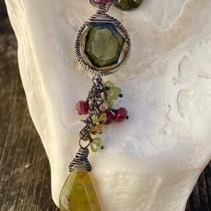 May include: A rustic wooden sign with the text "Welcome to our home" in white lettering. The sign features a distressed finish and a simple, inviting design, perfect for a front porch or entryway.