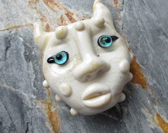 Bumpy Ivory horned Lampwork glass bead mask necklace pendant, mascaron handmade sculptural amulet, talisman, face bead, Isinglass Design