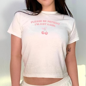 Coquette Baby Tee, Bow Crop Top, Just A Girl Baby Tee, Y2K Baby Tee, 90s Crop Top, Graphic T-Shirt, Vintage TShirt, Y2K Fashion, Retro Shirt