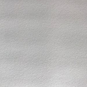 May include: A close-up of a white textured surface.