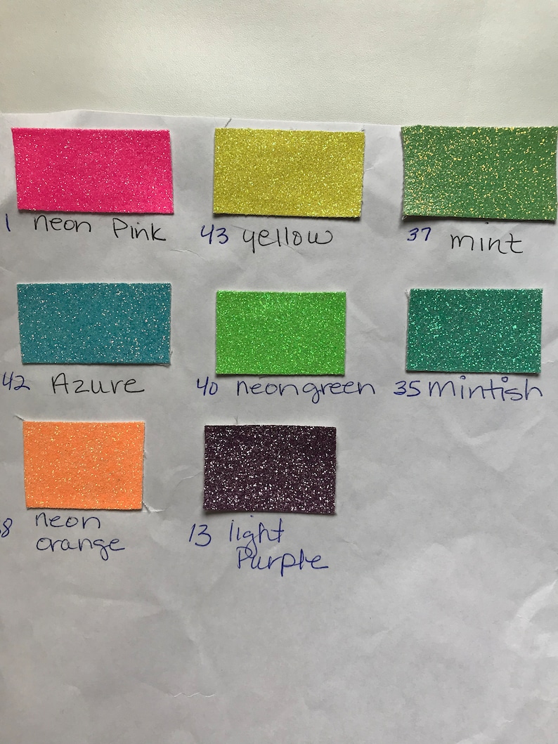 May include: A collection of 10 small squares of glitter paper in various colors, including neon pink, yellow, mint, azure, neon green, mintish, neon orange, and light purple. Each square is labeled with a number and a color name.