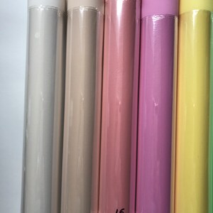 May include: Five rolls of colored paper wrapped in clear plastic. The rolls are labeled with numbers: 9, 12, 15, 22, and 18.