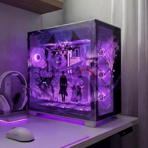 May include: A custom-built computer case with a purple-themed interior, illuminated by LED lights. The case features a glass panel displaying a detailed graphic. A white gaming mouse and headset are on the desk.