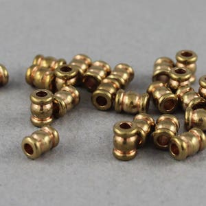 Tiny raw brass spacer tube beads with ribbed edge detail - 4.8mm x 3mm - 24 pcs - BC104