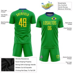 May include: Green soccer uniform set with yellow lettering and numbers. The jersey has a blue collar and the text "SHERFIELD" and "48" on the back. The front of the jersey says "LOSALTOS" and "06". The shorts have the number "17".