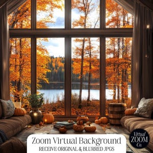 May include: A cosy living room with large windows overlooking a lake surrounded by autumn foliage. The room features two brown sofas, a wooden coffee table, and a variety of autumn-themed decorations, including pumpkins and gourds.