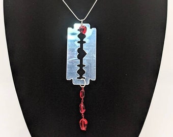 Mirrored acrylic razor blade necklace with red glass beads