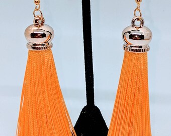 Orange tassel earrings