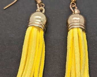 Small, yellow faux suede tassel earrings