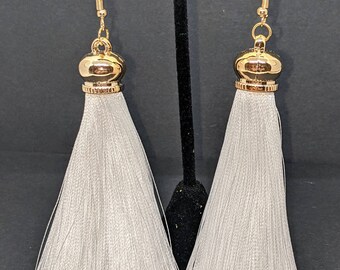 White tassel earrings