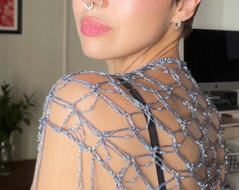 Shimmering crochet wrap with glass beads